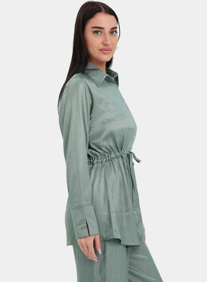 إلينا من دي ستايل مجموعة من بنطال وبلوزة بأربطة