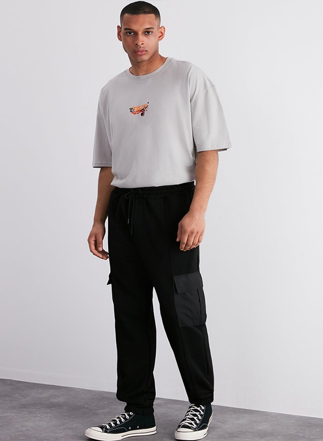 Black Oversize/Wide Cut Cargo Pocket Elastic Leg Sweatpants TMNSS24EA00003