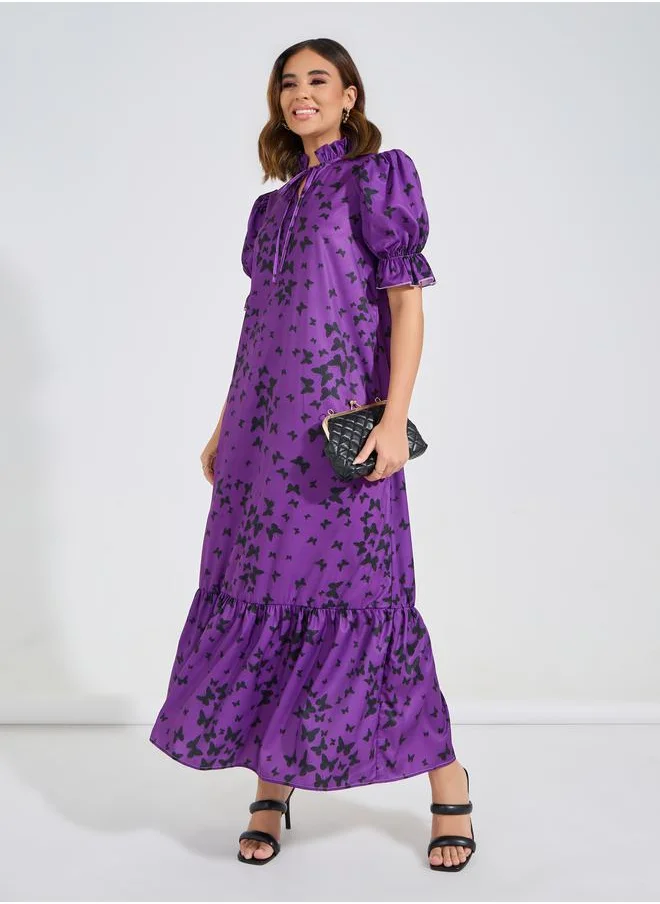 Causey All Over Butterfly Print Tie-Up Neck Maxi Dress by Styli