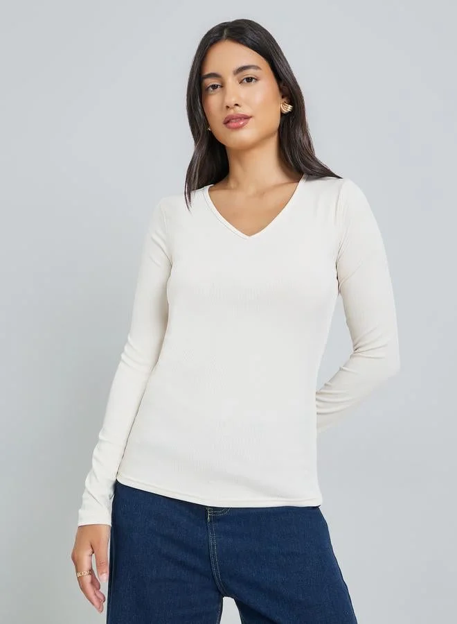 ستايلي Off-White Ribbed Knit Long Sleeve Top