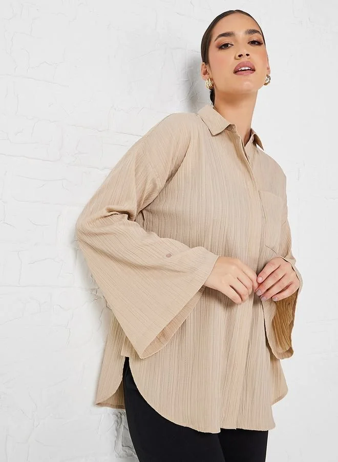 ستايلي Flare Sleeve Crepe Oversized Longline Shirt