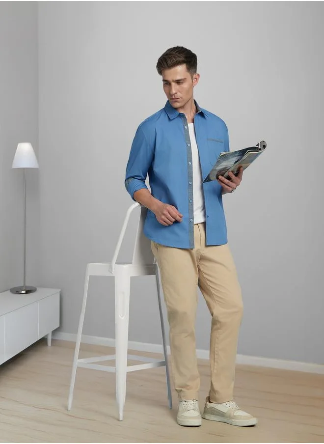 Dennis Lingo Elegant Blue Regular Fit Full Sleeve Shirt for Men with chambray accents on the collar, cuffs, and placket, made from 100% cotton – the perfect balance of sophistication and comfort.