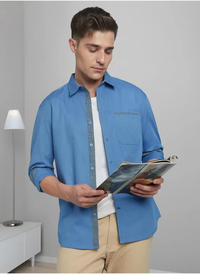 Dennis Lingo Elegant Blue Regular Fit Full Sleeve Shirt for Men with chambray accents on the collar, cuffs, and placket, made from 100% cotton – the perfect balance of sophistication and comfort.