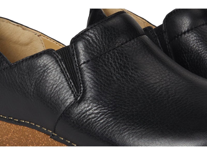 Dansko Meara Slip-On Shoe for Women - Dual-Density Cork/EVA Midsole and Lightweight Rubber Outsole Provide Durable and Comfortable Ride on Patented Stapled Construction Black 7.5-8 M US - Image 2