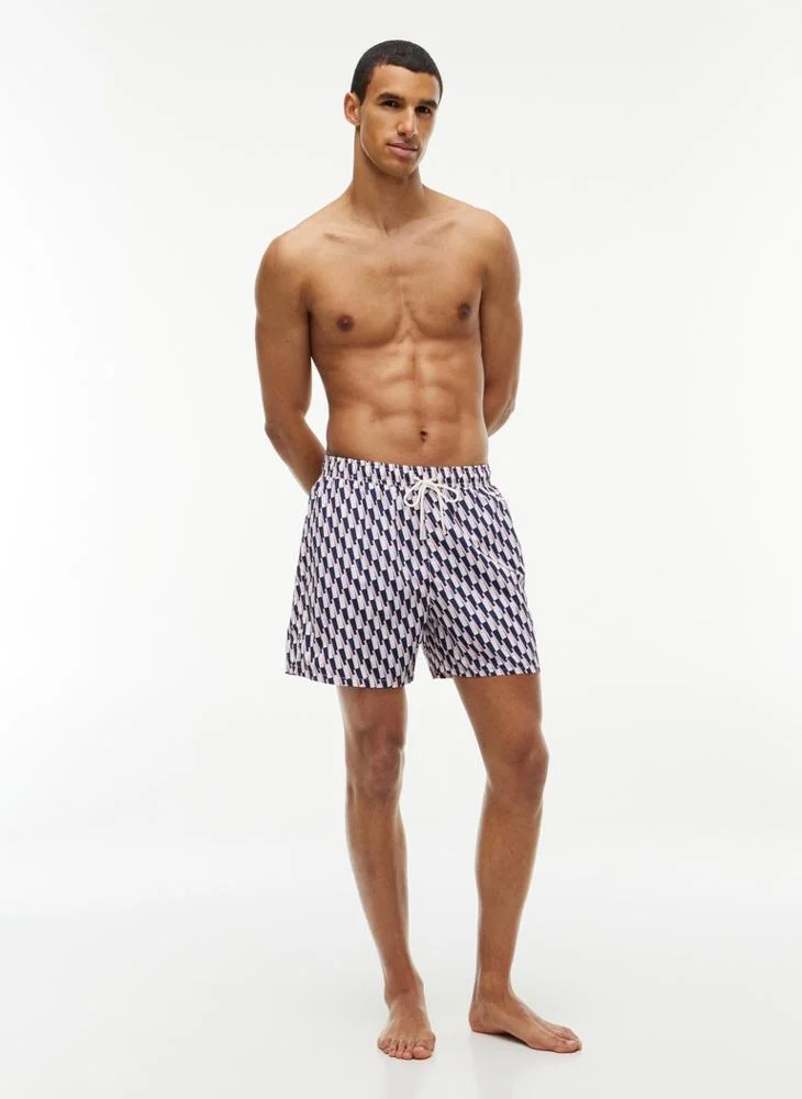 Tommy Hilfiger  Essential Print Mid Length Swim Shorts for Men | Best Price UAE