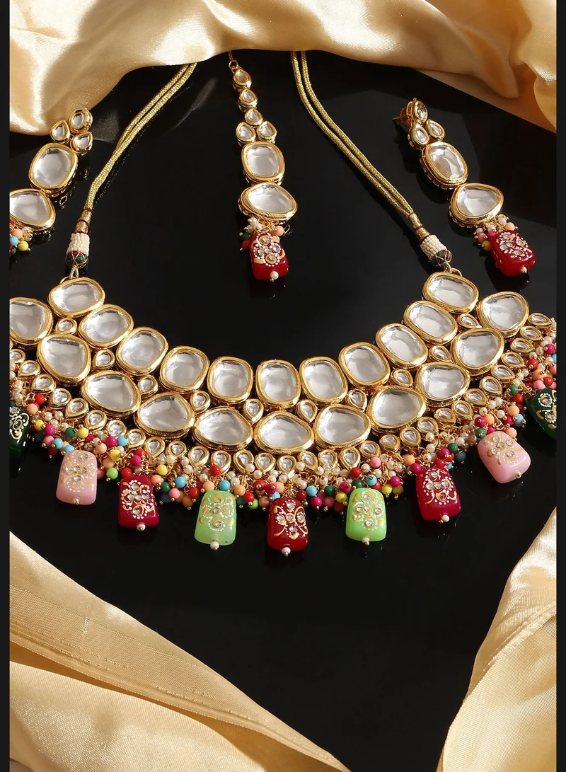 SOHI Gold Plated Designer Kundan Party Necklace, Earring and Maang Tikka Set For Women