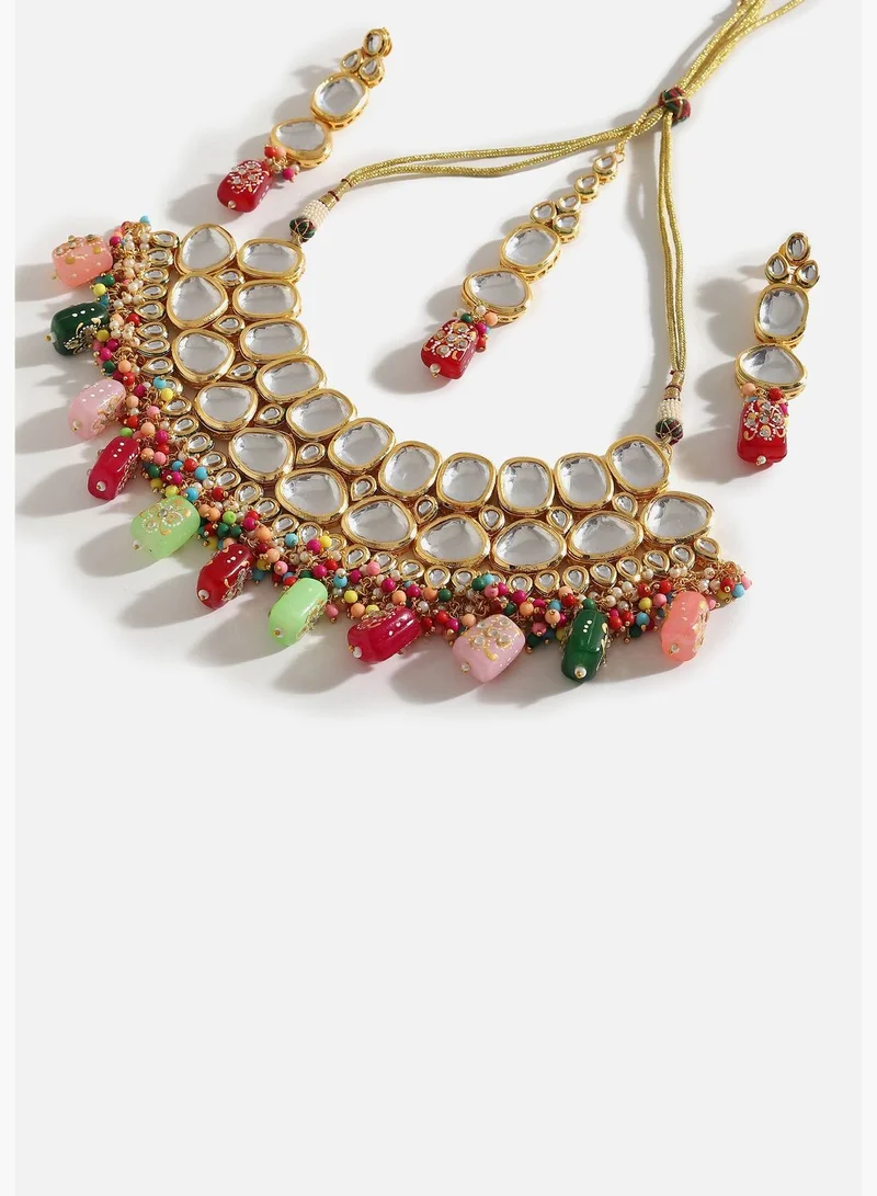 SOHI Gold Plated Designer Kundan Party Necklace, Earring and Maang Tikka Set For Women