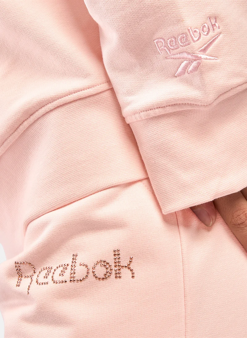 Reebok Pure Pink Studded Logo Pants for Women | Best Price UAE