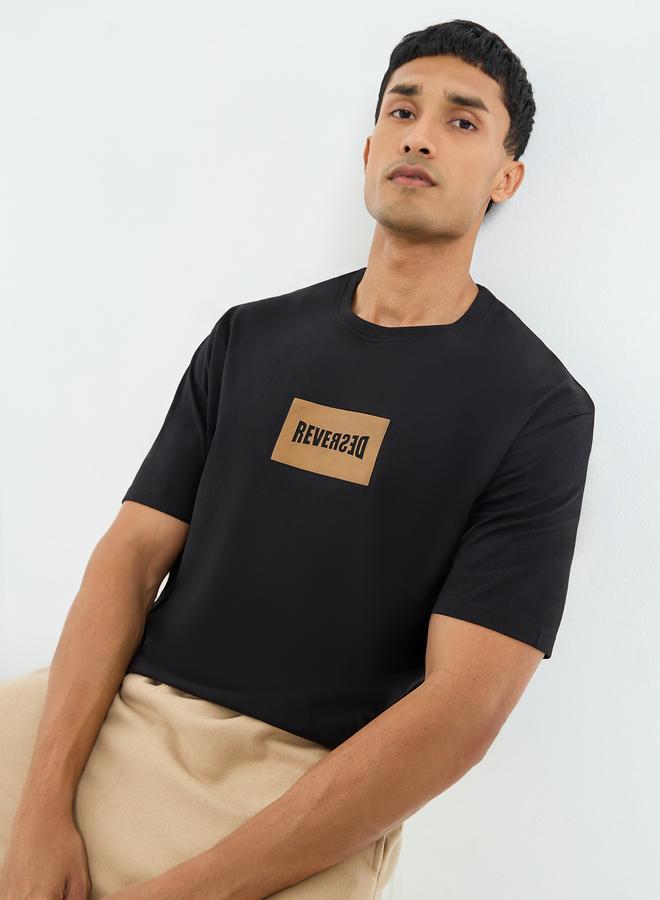 Styli Men Black Graphic Print Oversized T-Shirt - Image 1