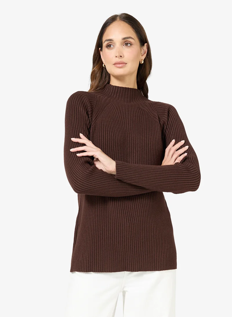 ايلا كنزة بياقة سلحفاة