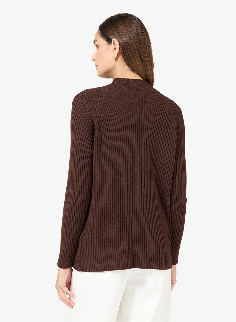 ايلا كنزة بياقة سلحفاة