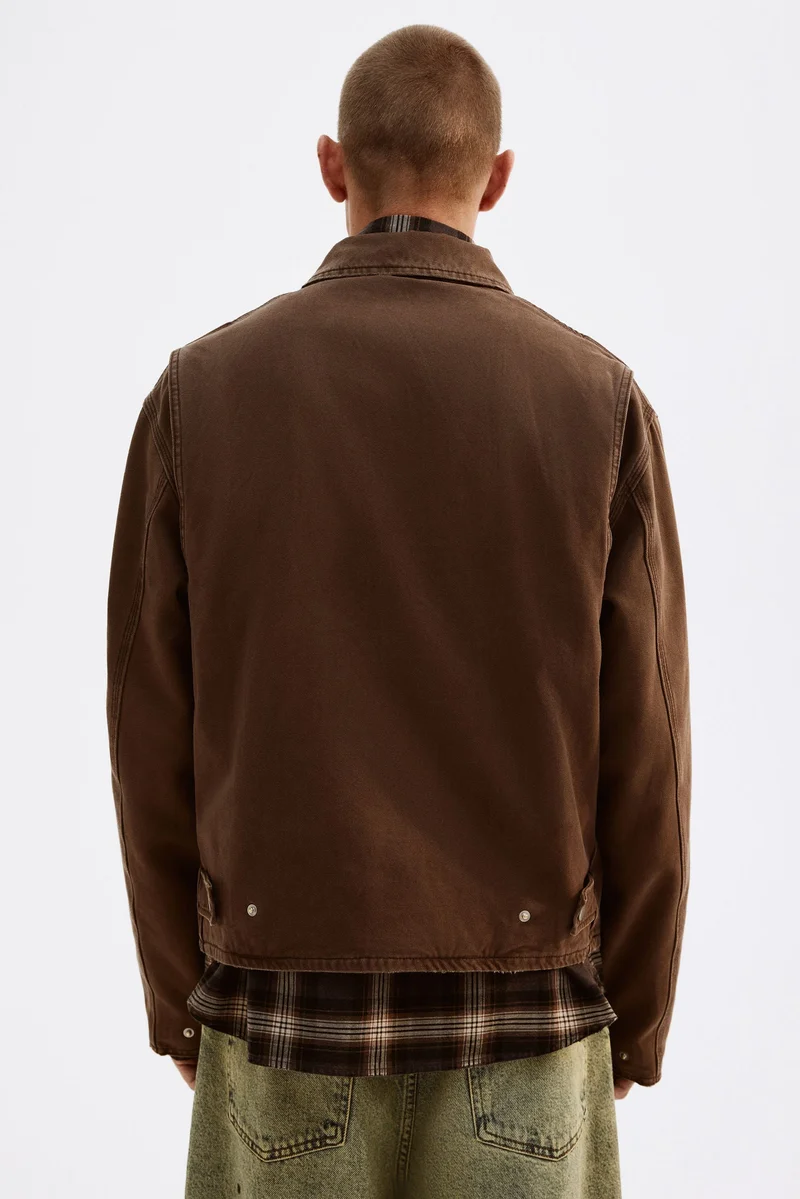 اتش اند ام جاكيت من قماش الكانفاس بقصّة عادية