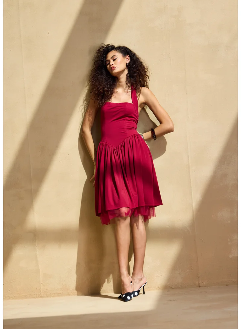 أشيتا فرنانديز Sleeveless Knee-Length Dress with Layered Hem – Wine Red
