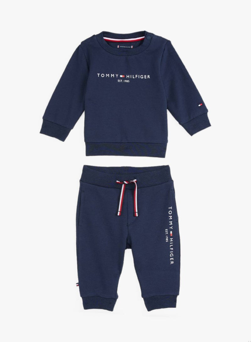 تومي هيلفيغر طقم سويتشيرت وبنطال رياضي إيسنشال بشعار - Image 1