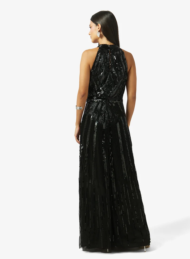 نمشي x فستان مزين بياقة هالتر