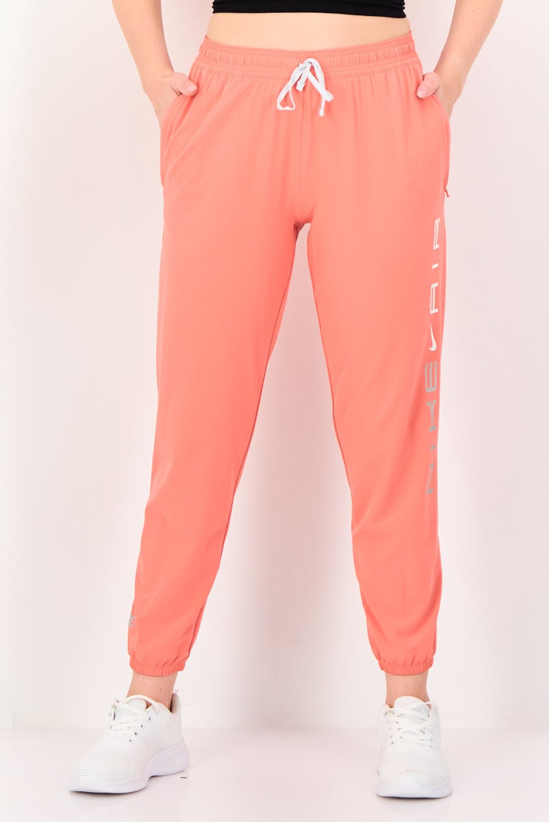 Nike Women Dri Fit Running Track Pants, Orange - Image 1