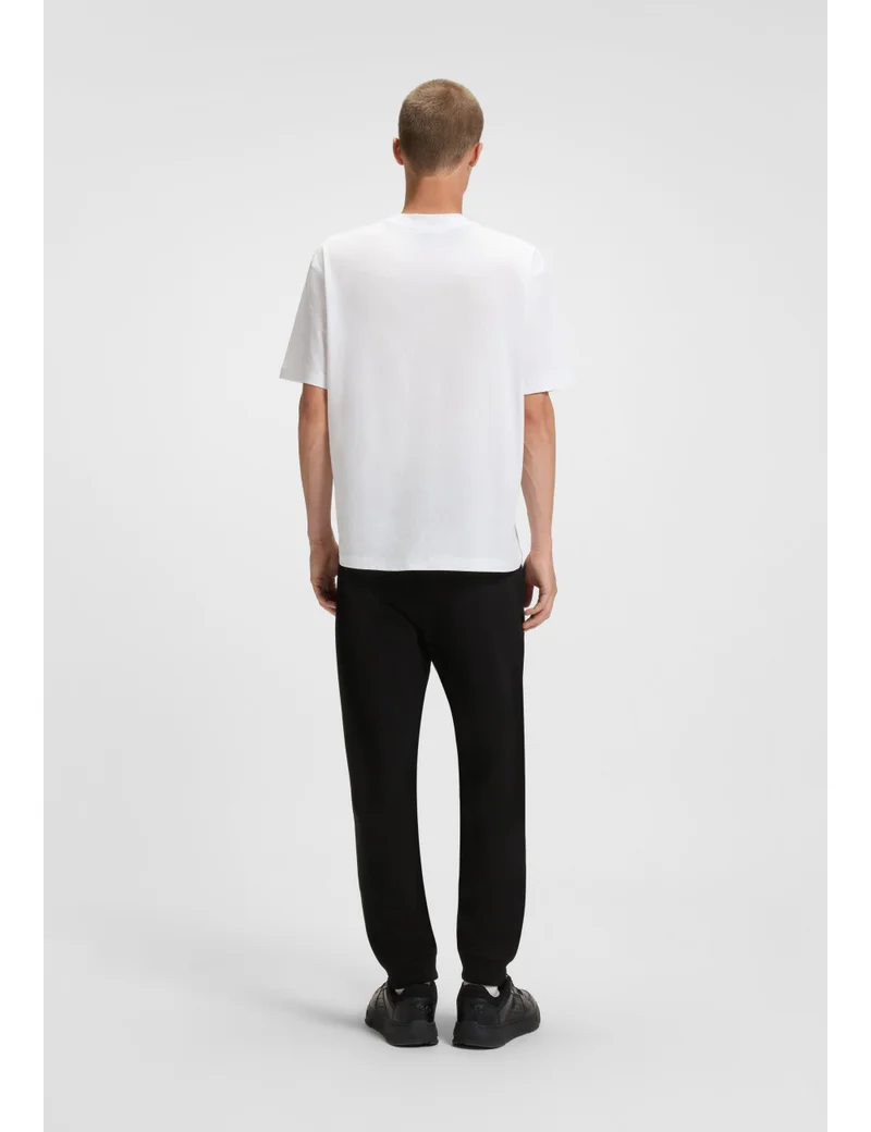 HUGO Cotton-terry tracksuit bottoms with blue logo patch