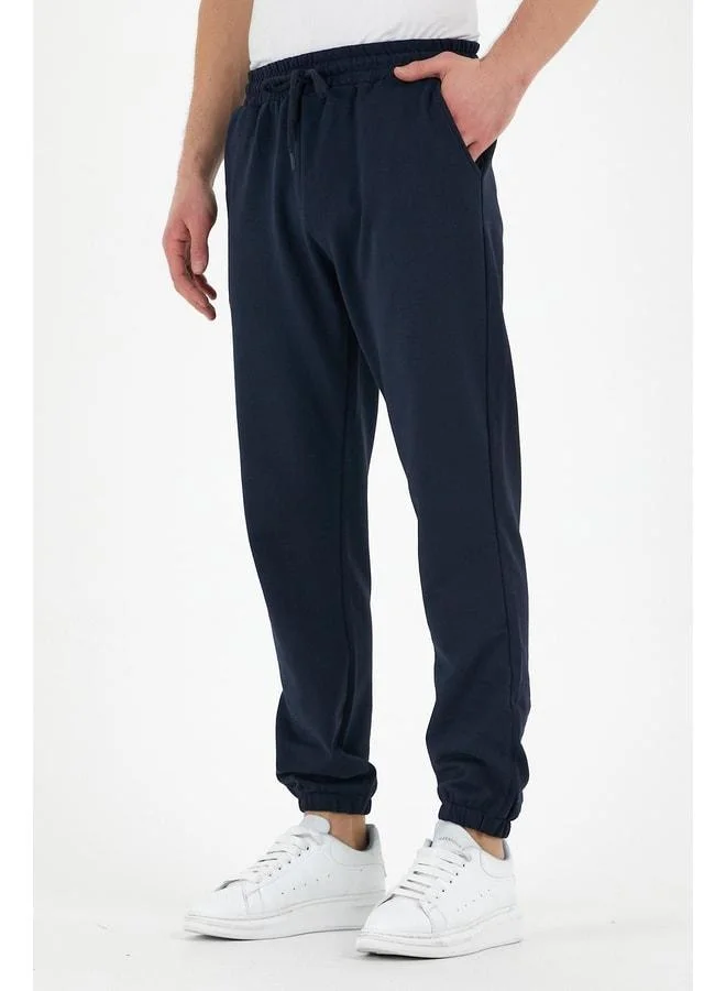 mmetalic Navy Men's Sweatpants with Label, Back and Side Pockets, Regular Fit, Elastic Cuffs