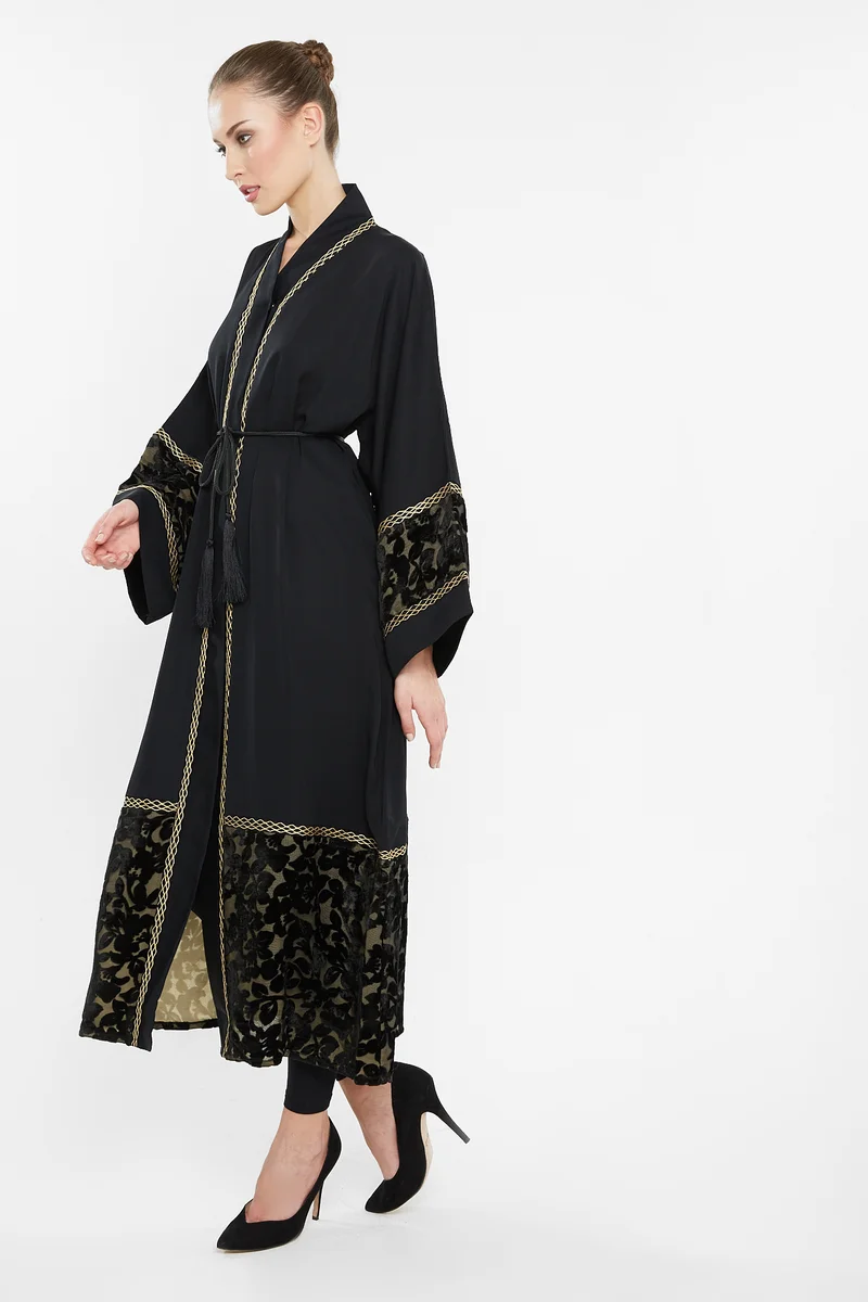 NUKHBAA A sensuous abaya with golden embroidery by the sides with velvet floral detailing by the sleeves and ends.-AJ105A