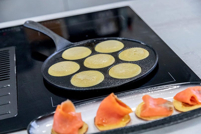 KitchenCraft KCBLINIS Induction Safe Blinis Pan with 7 Holes and Blini Recipe, Cast Iron, 24 cm, Black - Image 5