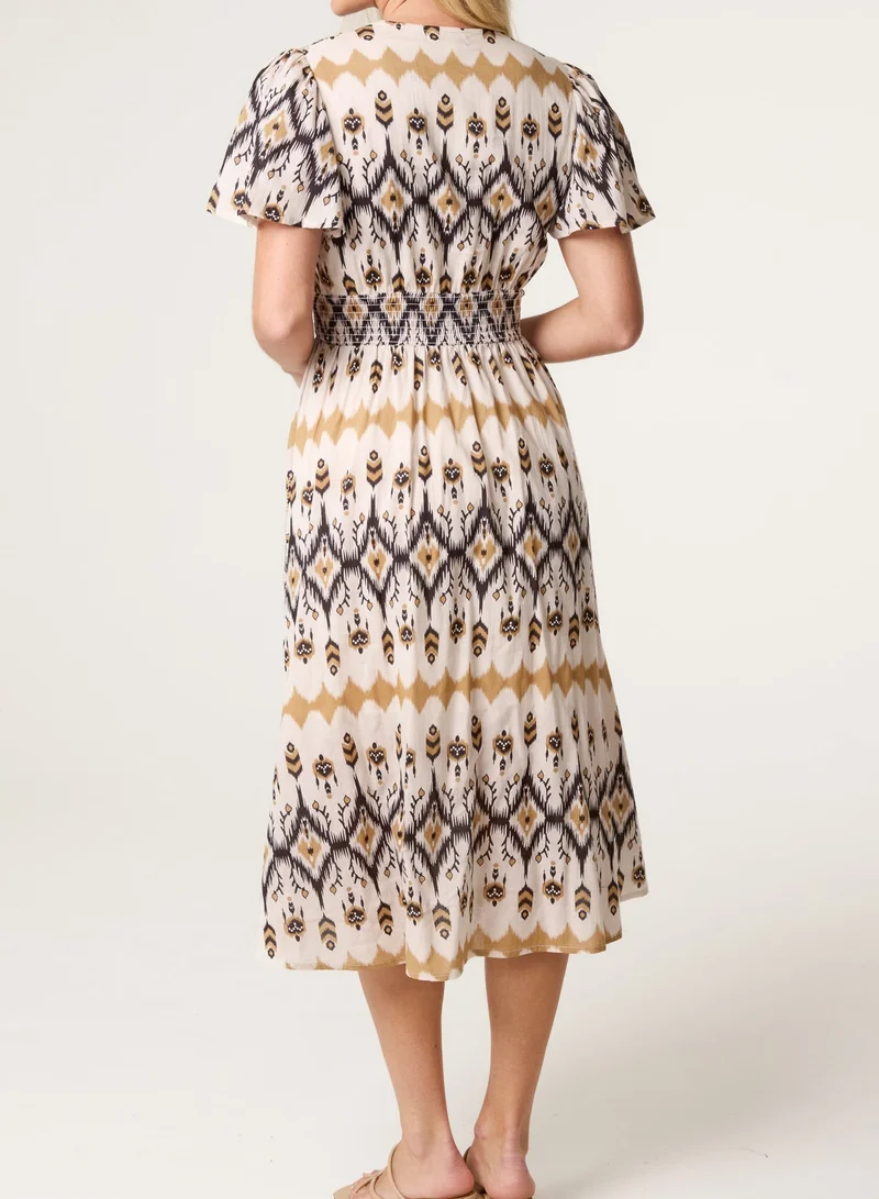 بلو فانيلا Embroidered Wrap Front Midi Dress