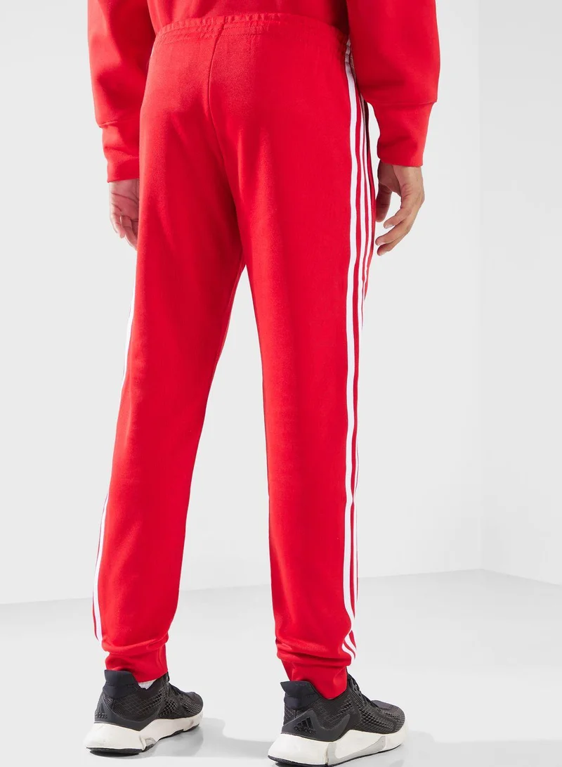 Adidas Originals red adidas SST TP Red Originals Men PANTS for Men | Best Price UAE