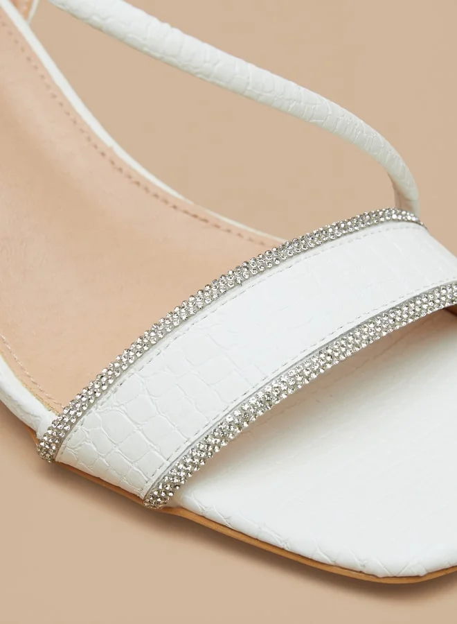 فلورا بيلا Women's Embellished Sandals with Flared Heels and Buckle Closure