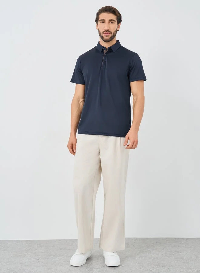 ستايلي تيشيرت بولو بقصة منتظمة بياقة متباينة