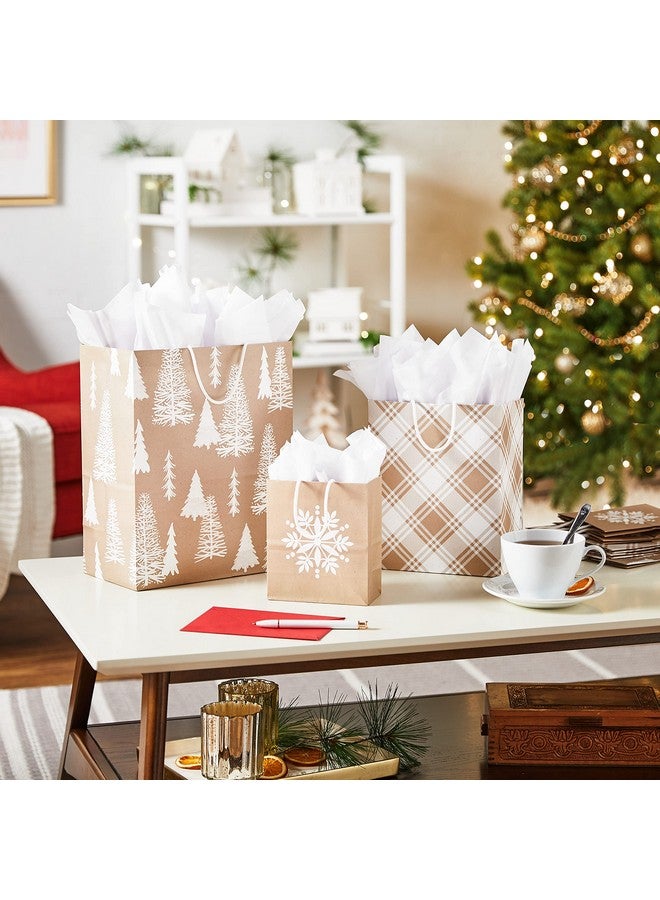 Hallmark Assorted Christmas Gift Bags, Recyclable Kraft Brown with Snowflake, Plaid and Trees (8 Bags: 3 Small 6", 3 Medium 9", 2 Large 13") for Holiday Parties, Hanukkah, Winter Weddings - Image 1