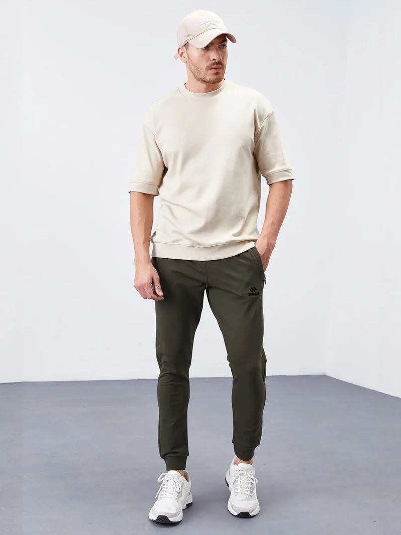 تومي لايف TOMMY Men's Slim-Fit Fleece Sweatpants