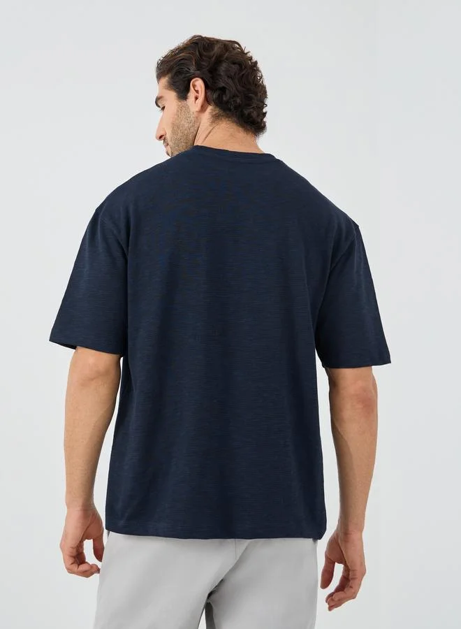 Styli Crew Neck Textured Oversized T-Shirt with Chest Pocket
