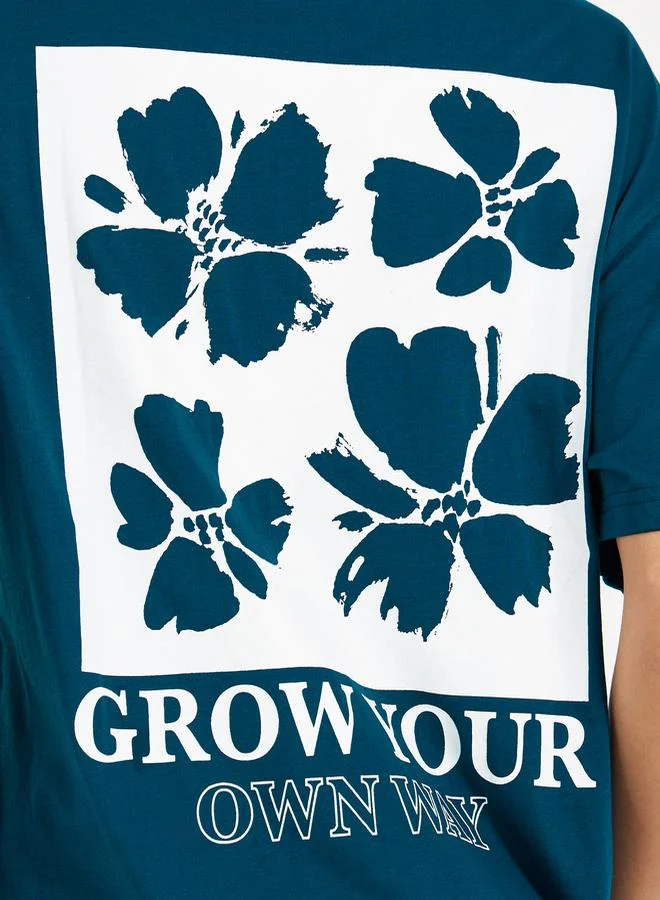 ستايلي تيشيرت فضفاض بطبعة كتابة وأكمام قصيرة