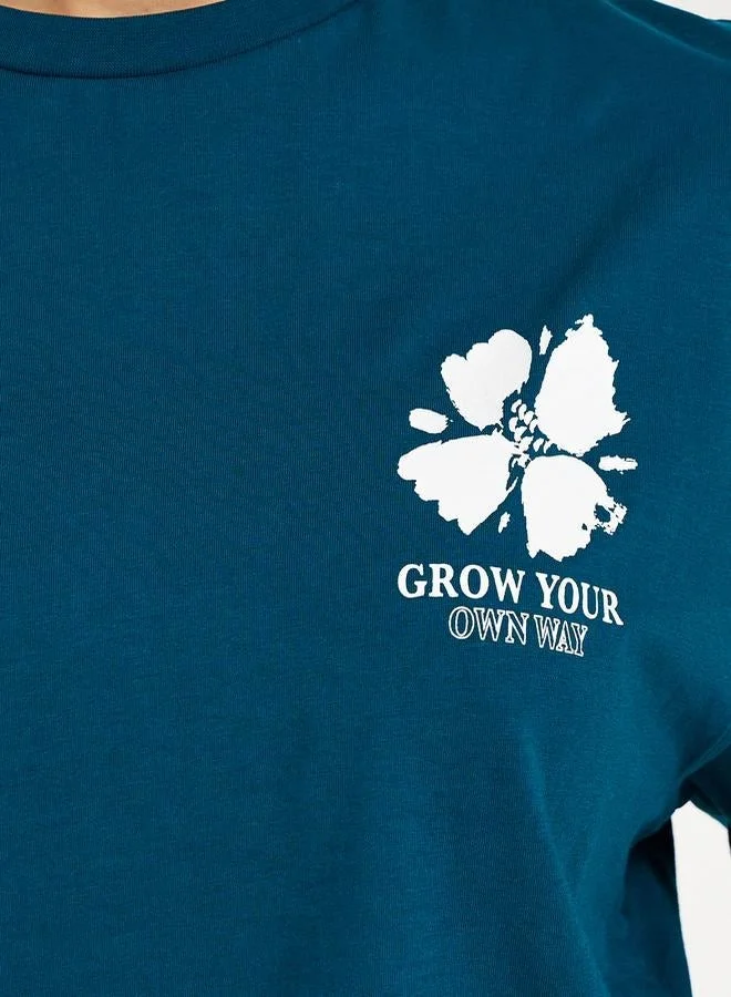 ستايلي تيشيرت فضفاض بطبعة كتابة وأكمام قصيرة