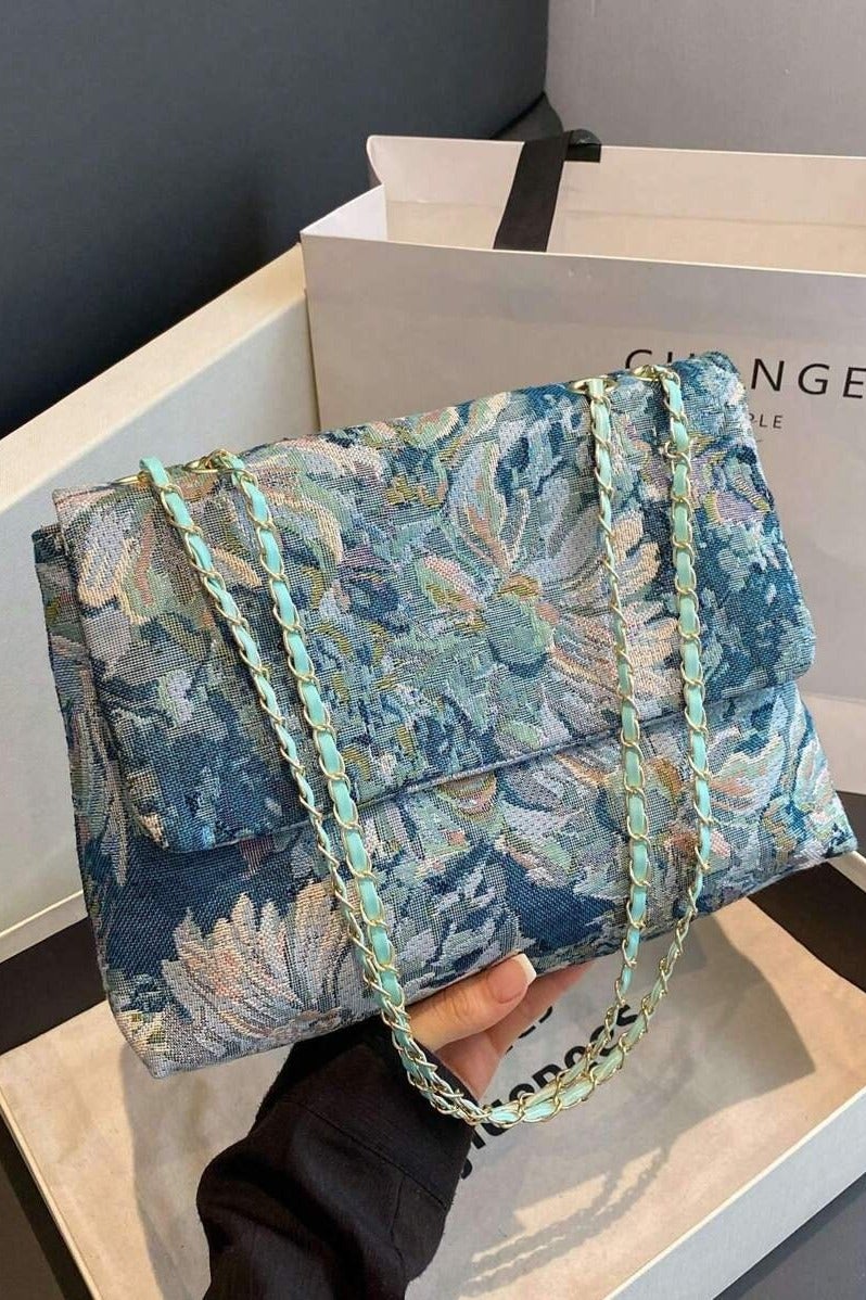 Elegant Rectangular Women's Handbag with Long Strap - Image 1