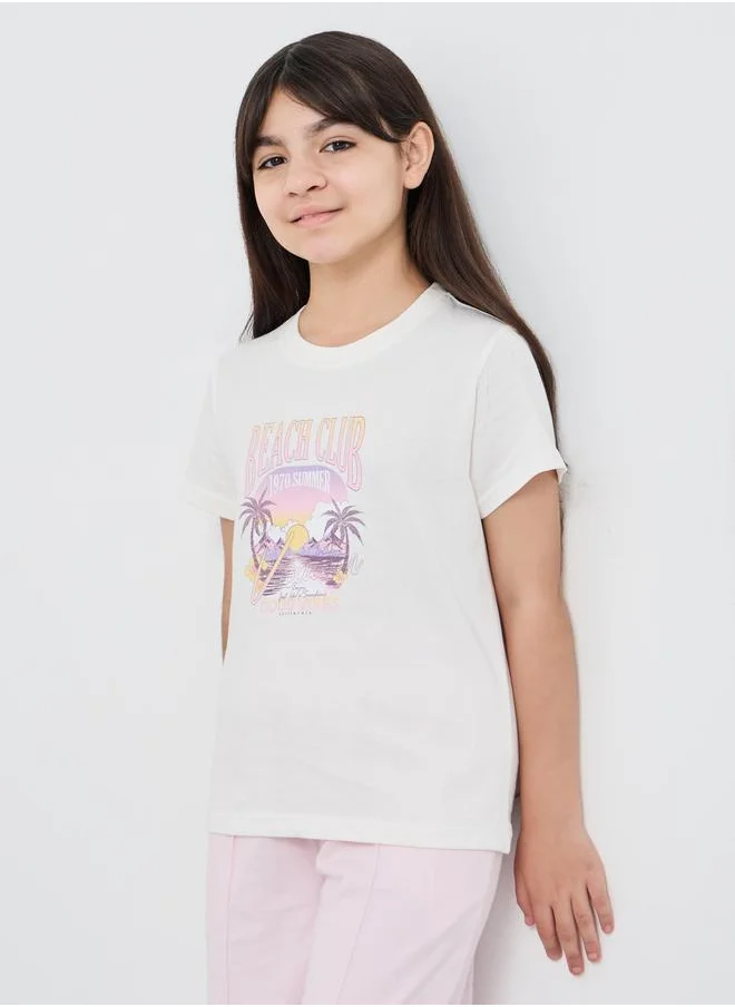ستايلي Styli Graphic Print Round Neck T-Shirt