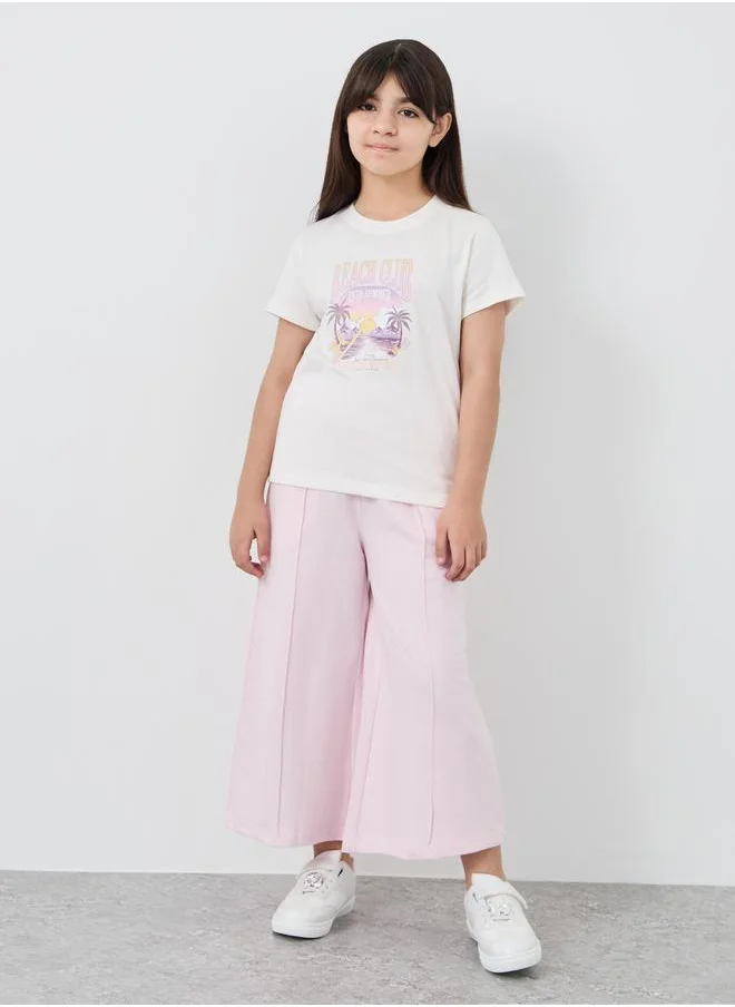 ستايلي Styli Graphic Print Round Neck T-Shirt