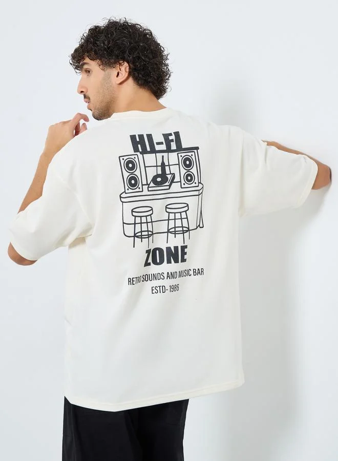 Styli Men Cream Front and Back Print Oversized T-Shirt