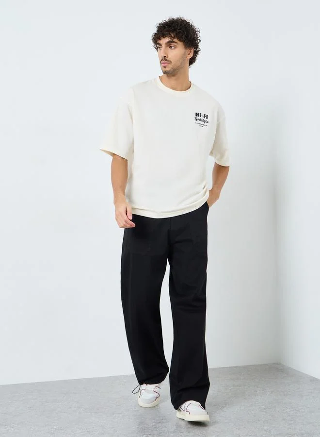 ستايلي تيشيرت فضفاض بطبعة أمامية وخلفية