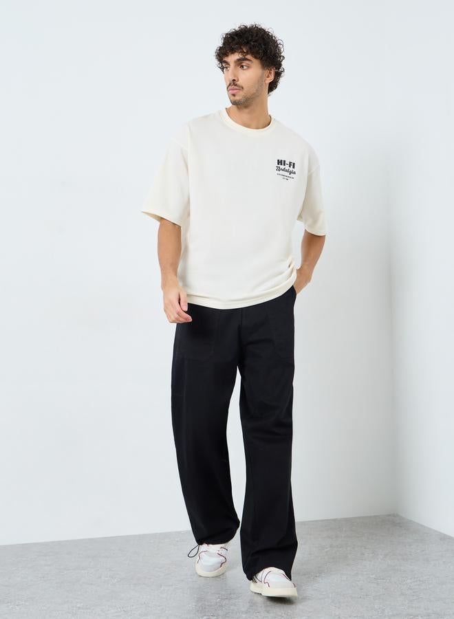 ستايلي تيشيرت فضفاض بطبعة أمامية وخلفية - Image 2