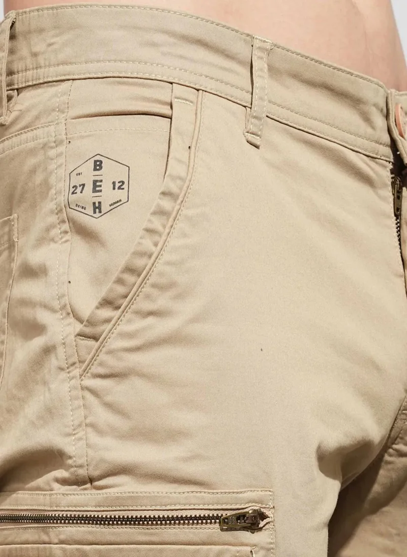 Being Human CREAM Men Classic Cargos Trousers for Men | Best Price UAE