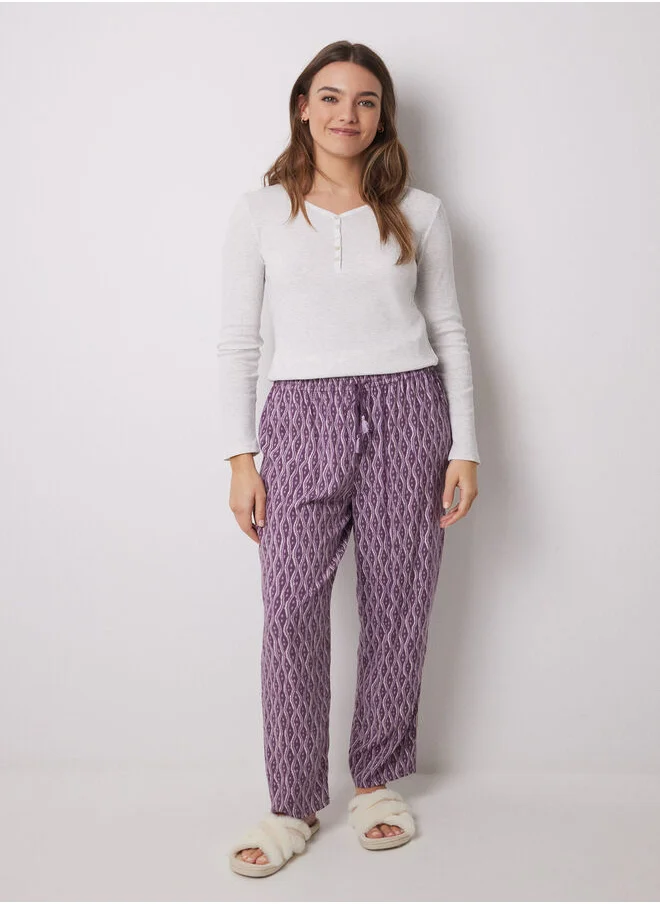 women'secret Viscose carrot trousers with ikat print