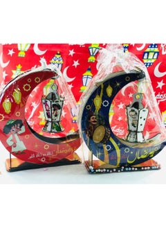 Crescent stand with blackberry lantern and wood printed with Ramadan characters. Colored wood with light. Size: 27*33 cm.