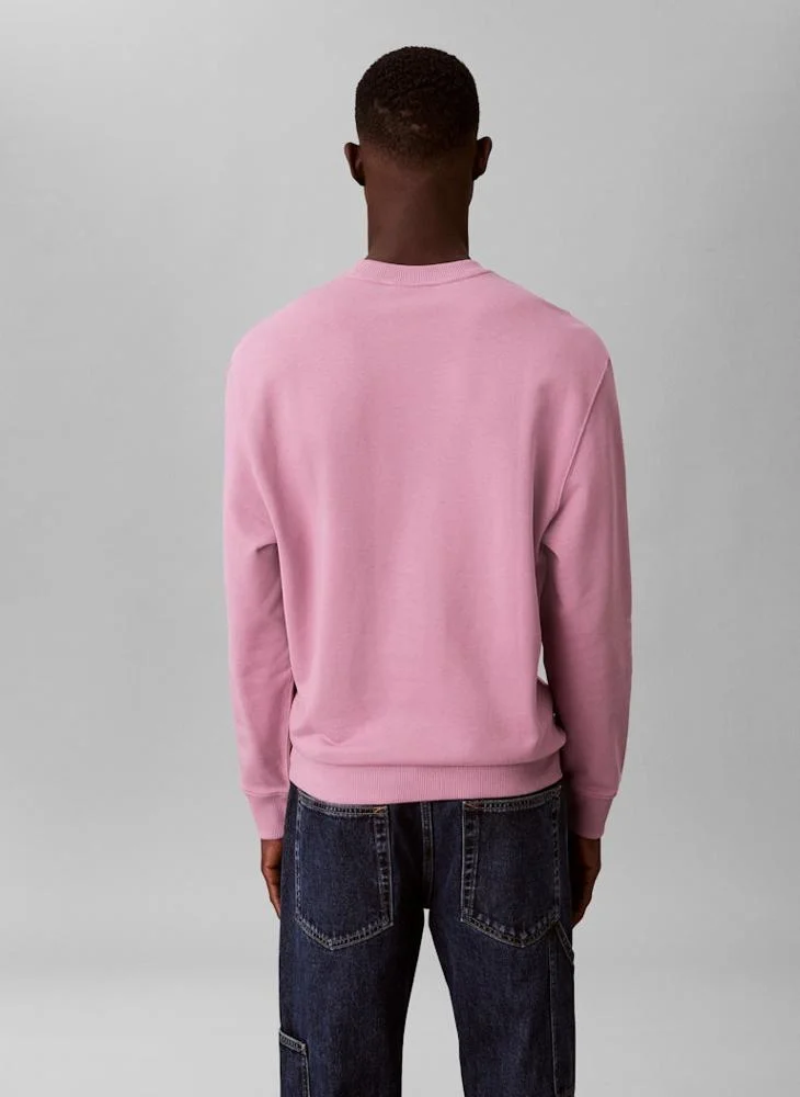 كالفن كلاين جينز سويت شيرت تيري بياقة دائرية بحروف أولى