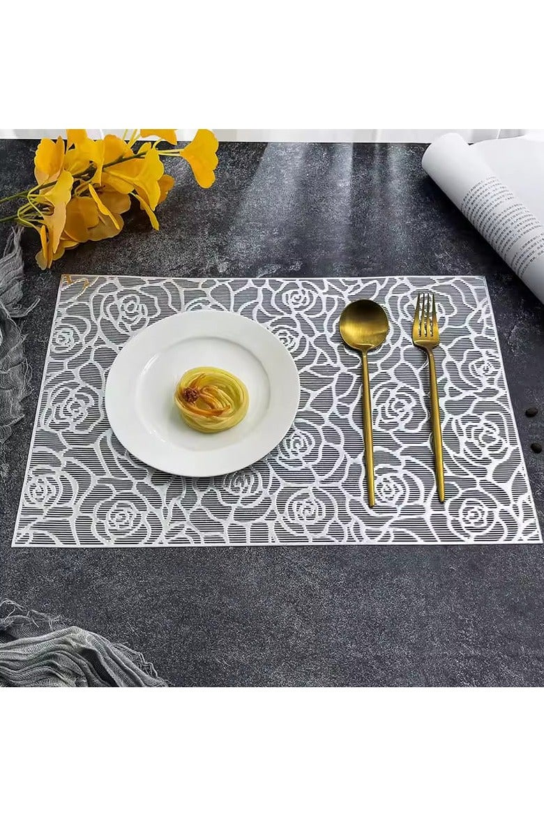 كوستر بنقوش زهريه للسفرة ( 2 قطعة ) يستخدام الكوستر لوضع الأواني الساخنة عليها، مما يحمي السفرة من الحرارة والتلف. - Image 1