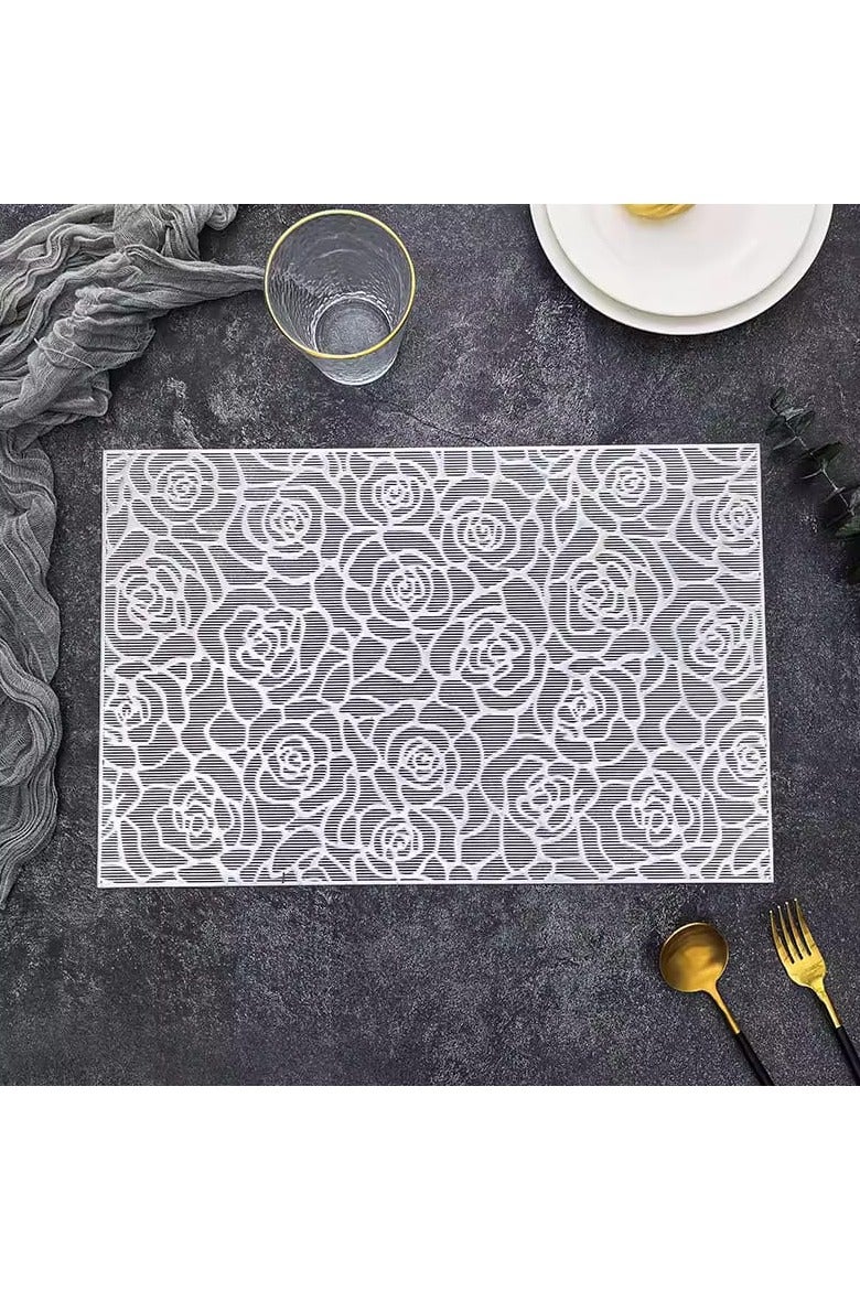 كوستر بنقوش زهريه للسفرة ( 2 قطعة ) يستخدام الكوستر لوضع الأواني الساخنة عليها، مما يحمي السفرة من الحرارة والتلف. - Image 2