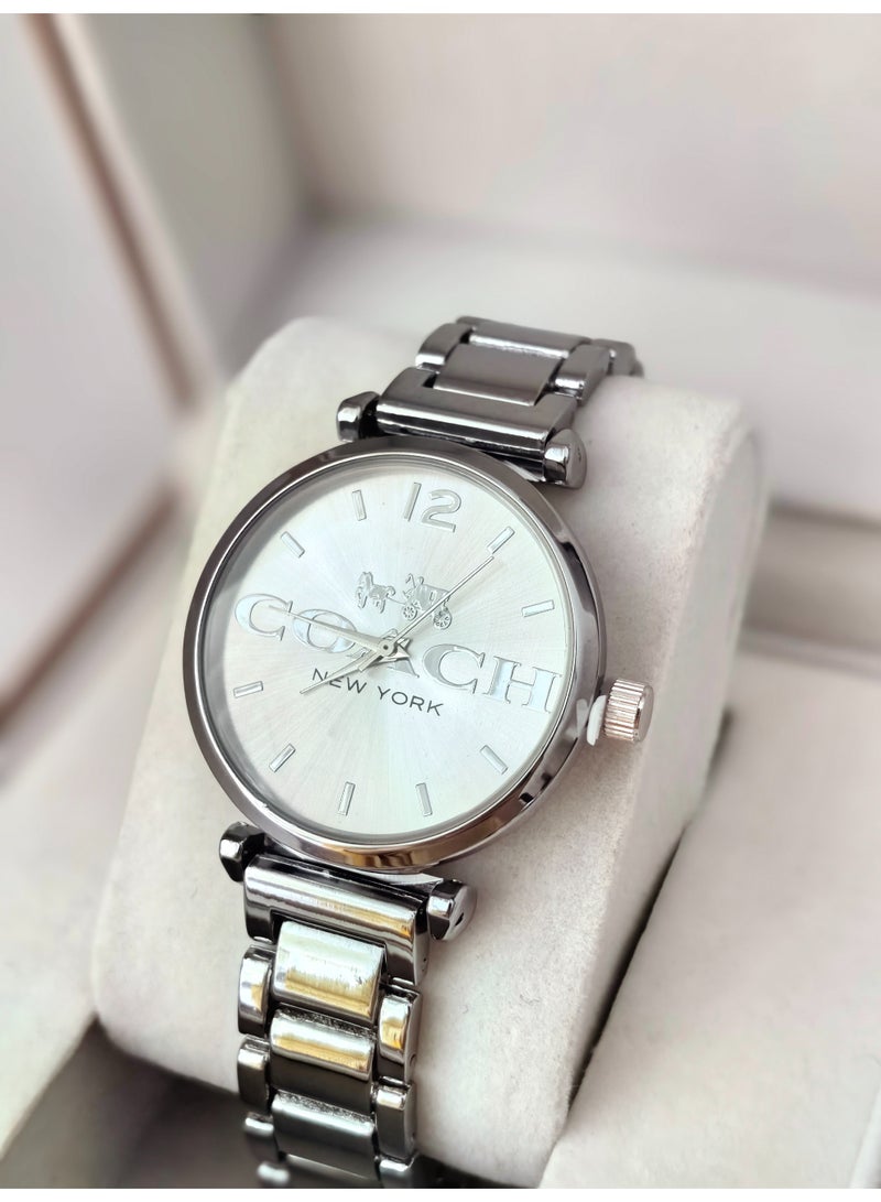 coachoutlet Women's Analog Watch with Silver-Tone Bracelet - Image 3