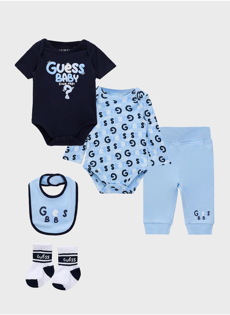 GUESS Kids  2 Pack Bodysuit, Bib, Socks & Pants Gift Set  - Image 1
