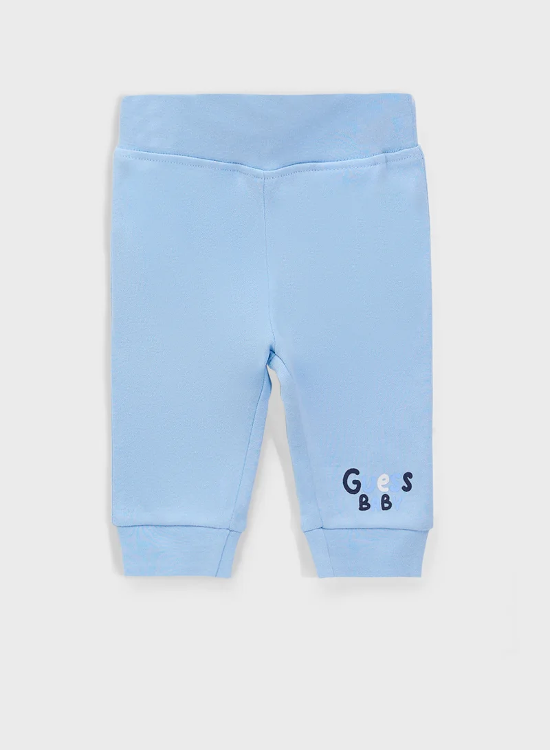 GUESS Kids  2 Pack Bodysuit, Bib, Socks & Pants Gift Set