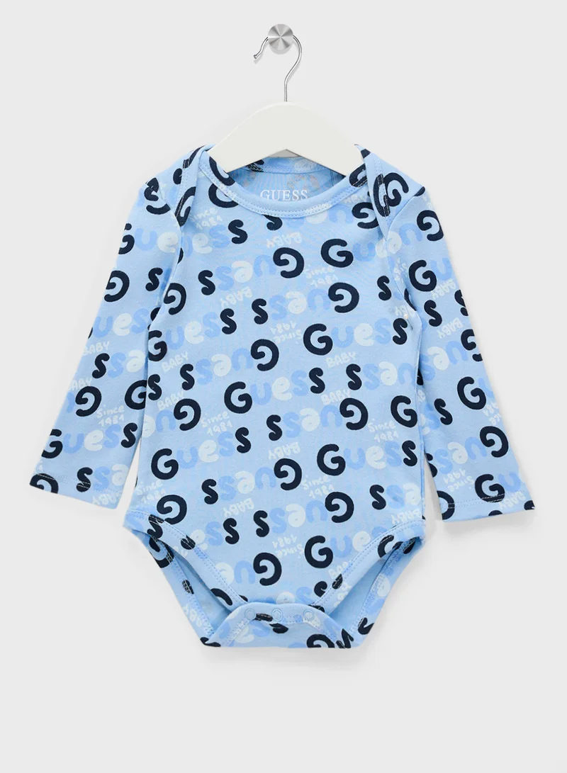GUESS Kids  2 Pack Bodysuit, Bib, Socks & Pants Gift Set