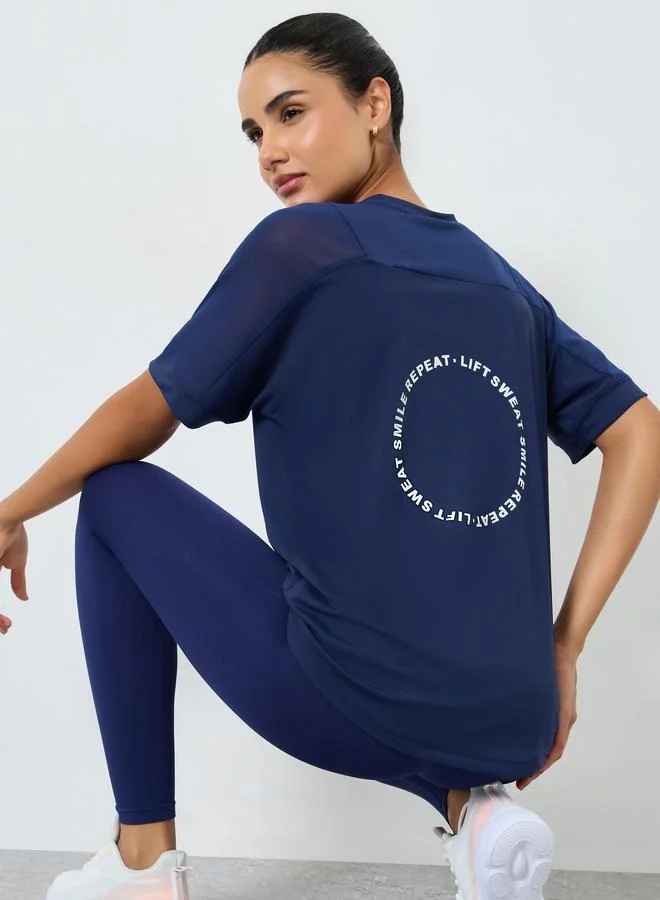 Styli Active Mesh Insert Back Text Detail Short Sleeve Top